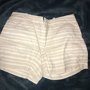 Badge and white striped shorts
